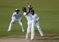 SHARJAH, UNITED ARAB EMIRATES - OCTOBER 31: Roston Chase of West Indies brings up his 50 with a 6 on day two of the third test between Pakistan and West Indies at Sharjah Cricket Stadium on October 31, 2016 in Sharjah, United Arab Emirates. (Photo by Chris Whiteoak/Getty Images)